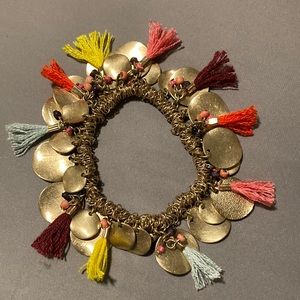 Gold-tone bracelet with beads and tassels